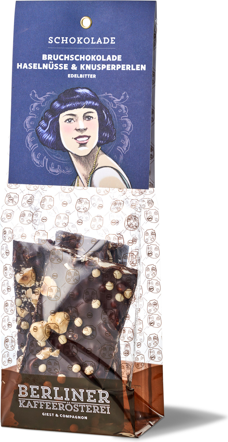 BKR - Edelbitter-Bruchschokolade mit Haselnüssen und Knusperperlen BKR - Edelbitter-Bruchschokolade mit Haselnüssen und Knusperperlen