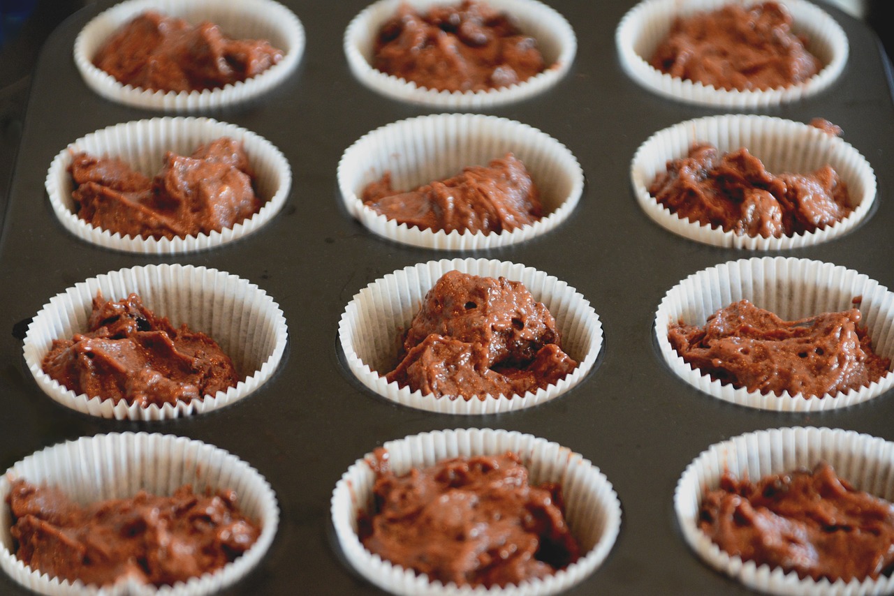 Muffinteig in Muffinförmchen